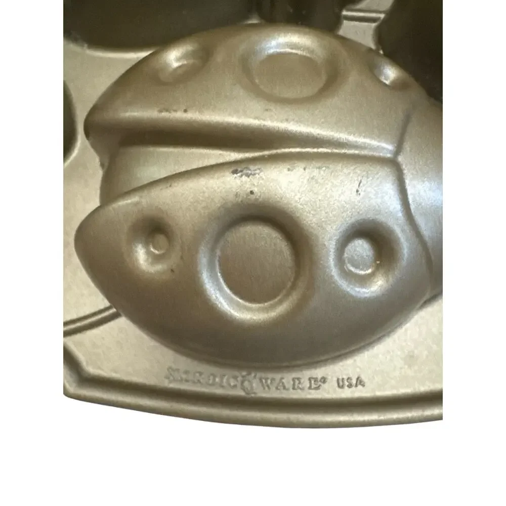 Nordic Ware Williams Sonoma Backyard Bugs Gold Aluminum Baking Pan